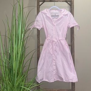 Pink and white striped button up dress with belt! Bow tie detail on sleeve.